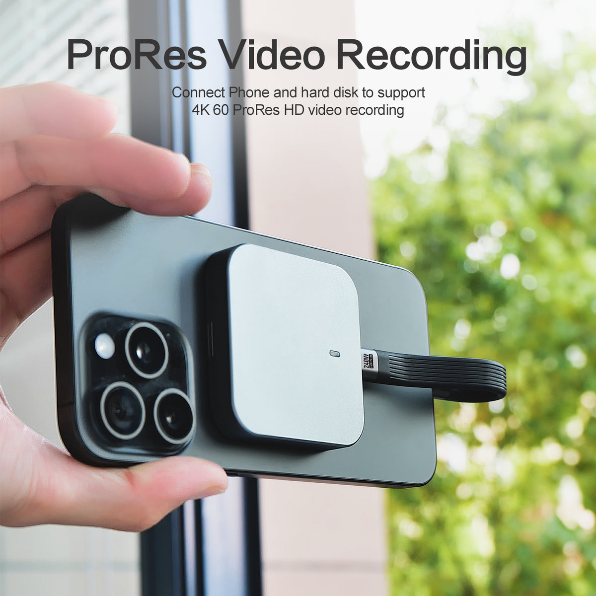 Short USB-C cable connecting an iPhone Pro to external storage for a compatible recording setup