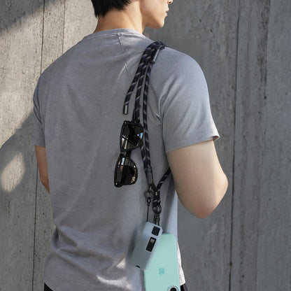 Adjustable charging lanyard worn crossbody for everyday carry